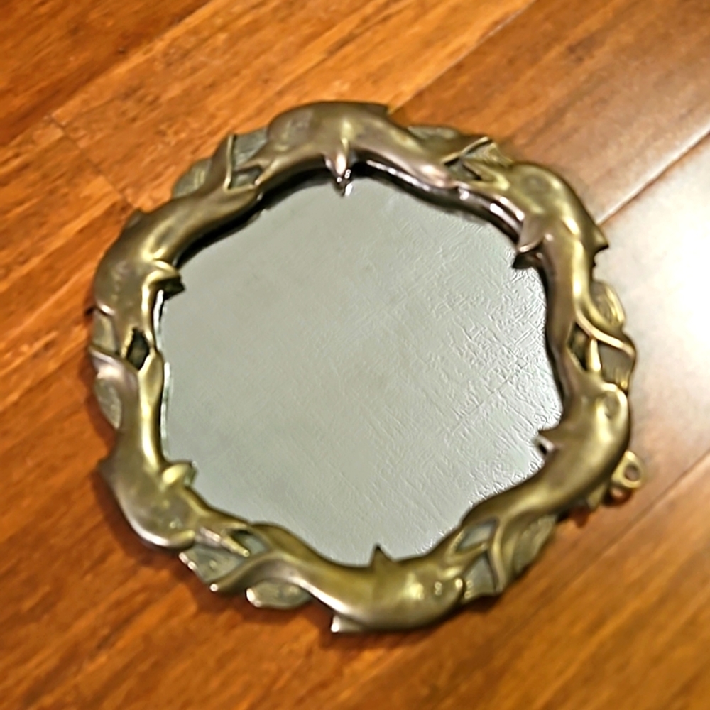 Vintage brass dolphin decor